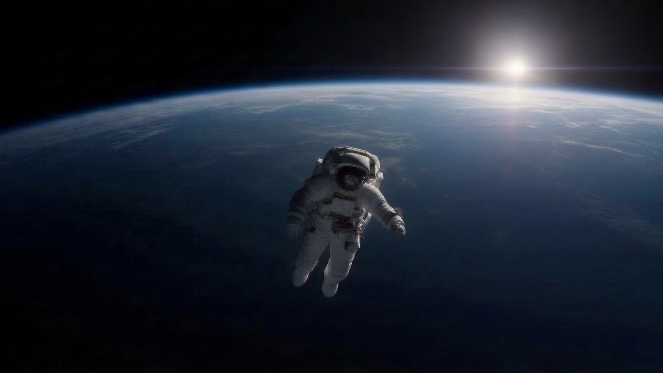 Astronaut floating above Earth